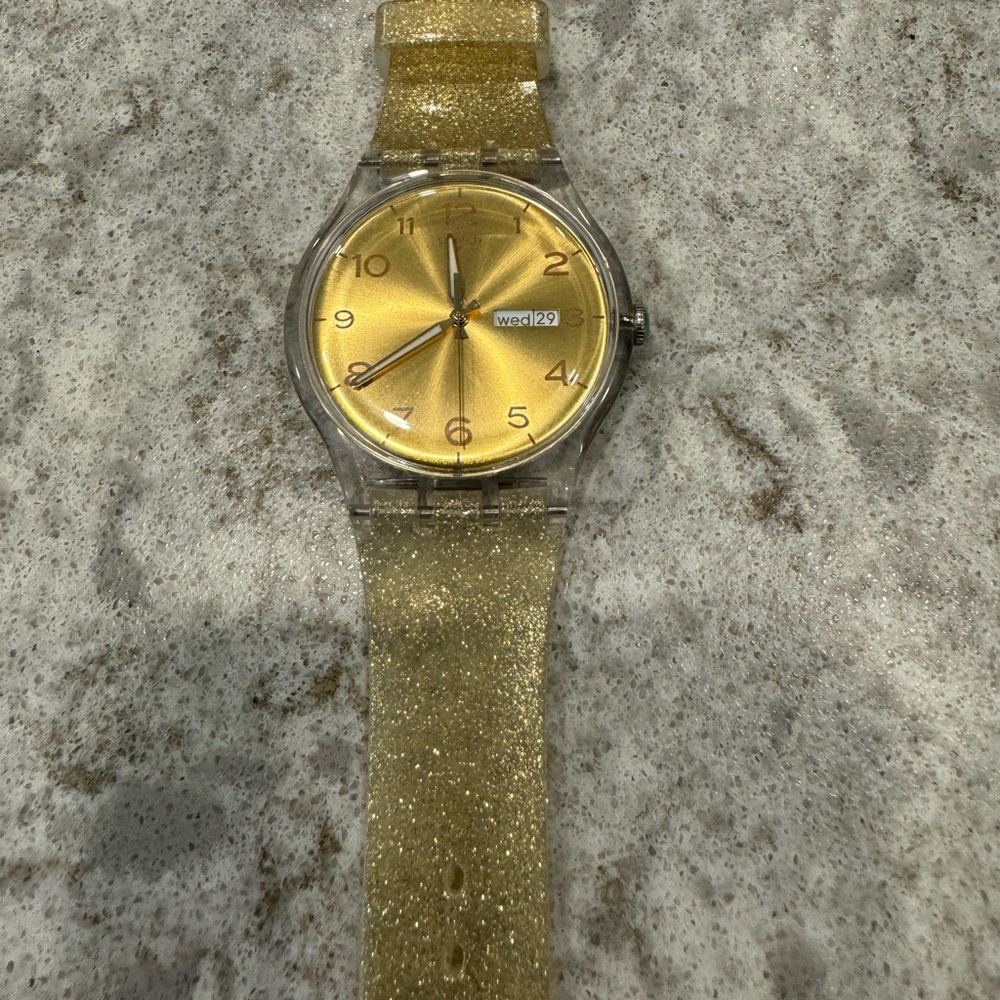 SWATCH watch - Shimmery gold band with iridescent watch face; Day & Date se…